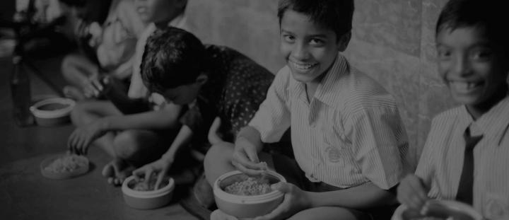 Who is eligible to participate in the Mid Day Meal Programme?